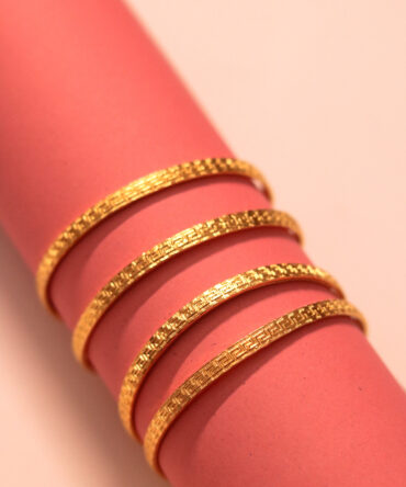 Radiant Gold Bangles with Intricate Maze Pattern