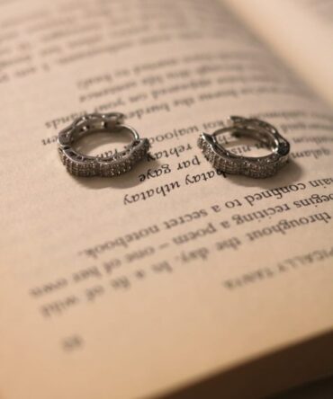 Shimmering silver hoops adorned with sparkling, eye-catching stones